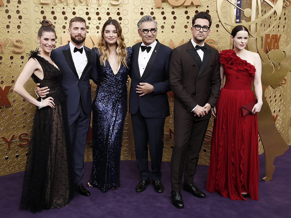 Cast members of 'Schitt's Creek' arrive for the 71st annual Primetime Emmy Awards ceremony held at the Microsoft Theater in Los Angeles, Calif., on Sept. 22, 2019.