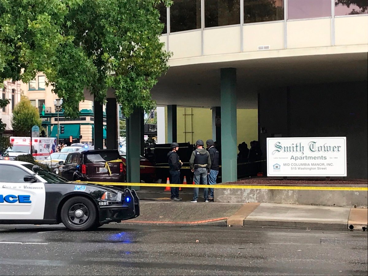 Police surround Smith Tower after reports of a shooting, Thursday, Oct. 3, 2019 in Vancouver, Wash.