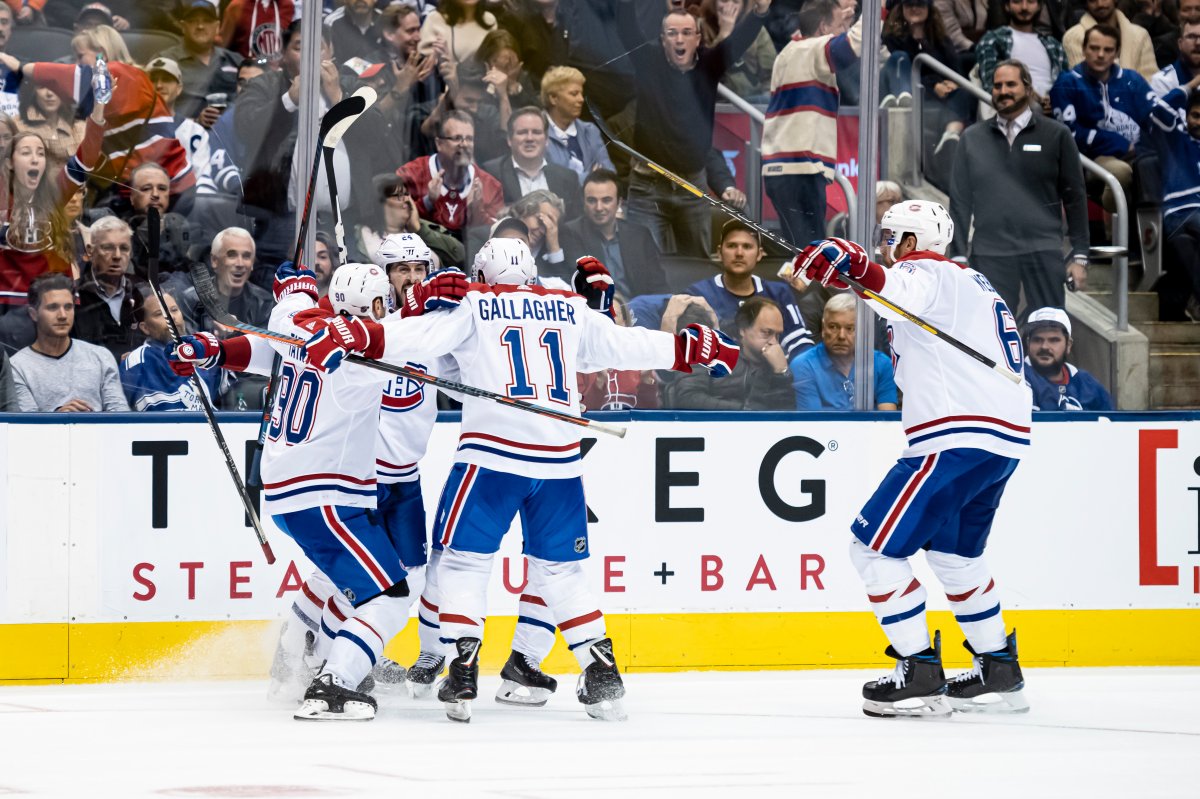 Montreal Canadiens celebrate a goal during third period NHL hockey action against the Toronto Maple Leafs, in Toronto, Saturday, Oct., 5, 2019. 