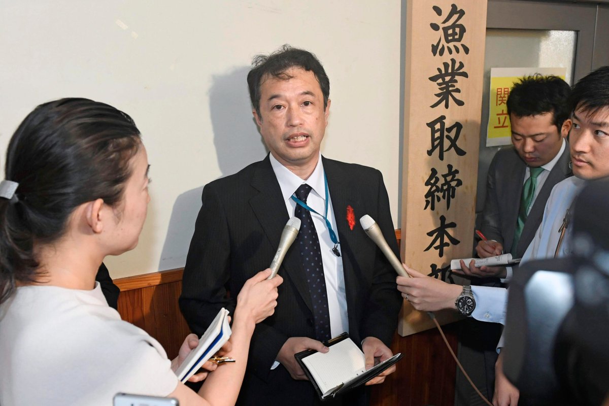 An official of the Japanese Fisheries Agency speaks to media following a collision between its patrol boat and a North Korean fishing boat, in Tokyo Monday, Oct. 7, 2019. The agency said Monday's collision occurred in the area known as Yamatotai, off Japan's northern coast of the Noto Peninsula. 