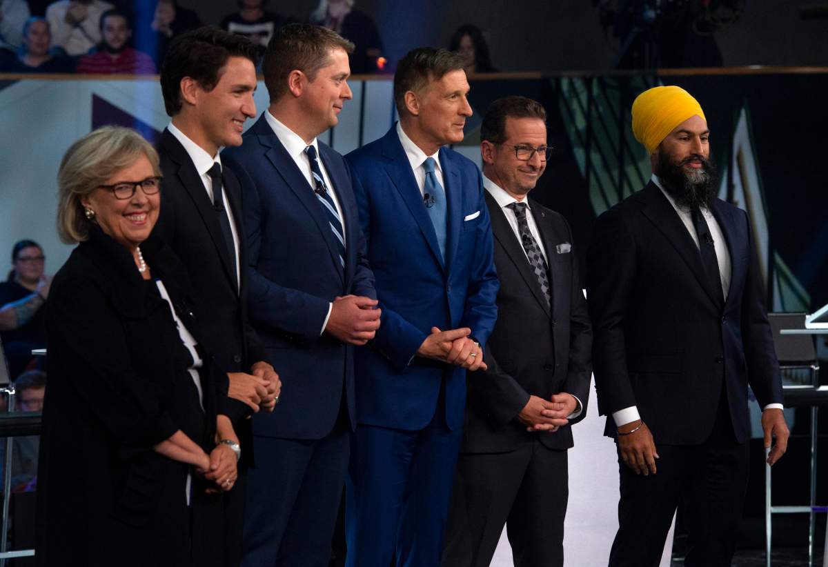 Federal party leaders Green Party leader Elizabeth May, Liberal leader Justin Trudeau, Conservative leader Andrew Scheer, People’s Party of Canada leader Maxime Bernier, Bloc Quebecois leader Yves-Francois Blanchet and NDP leader Jagmeet Singh pose for a photograph before the Federal leaders debate in Gatineau, Que. on Monday, October 7, 2019. THE CANADIAN PRESS/Sean Kilpatrick
