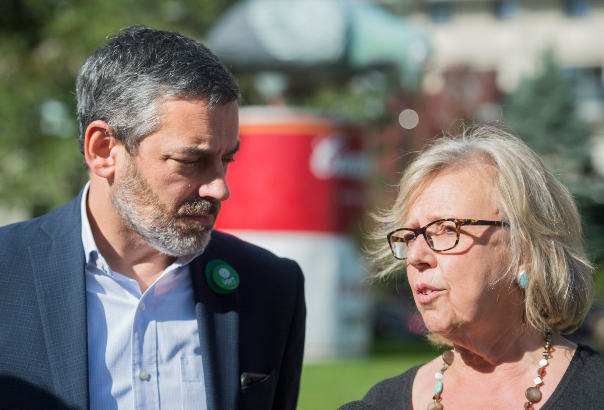 Green Party leader Elizabeth May and candidate Pierre Nantel speak to reporters during a federal election campaign stop in Longueuil, Que., Tuesday, October 8, 2019.