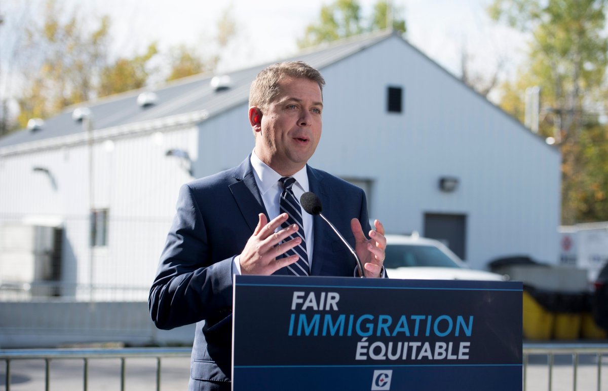 Conservative leader Andrew Scheer makes a morning announcement at the Canada/USA boarder on Roxham road during a campaign stop in Lacolle, Que. Wednesday, October 9, 2019.  