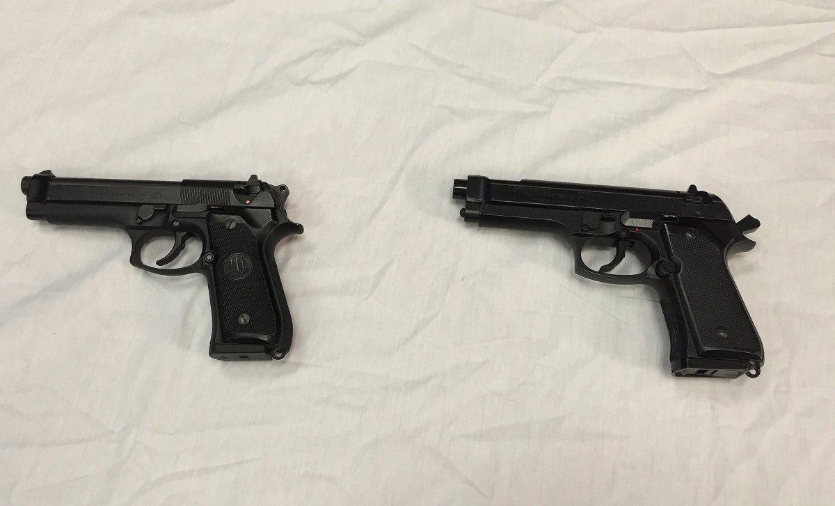 FILE - This April 28, 2016, file photo shows a semi-automatic handgun, left, next to a Powerline 340 BB gun, right, displayed during a news conference in Baltimore. A Manitoba judge is calling for new rules governing imitation firearms, in order to reduce the risk of fatal shootings involving police and so-called suicides-by-cop. 