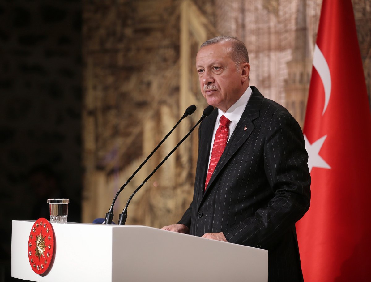 Turkish President Recep Tayyip Erdogan speaks to the foreign media, in Istanbul, Friday, Oct. 18, 2019. Turkey's president says his country "cannot forget" the harshly worded letter from U.S. President Donald Trump about the Turkish military offensive into Syria. But he says the mutual "love and respect" between the two leaders prevents him from keeping it on Turkey's agenda.