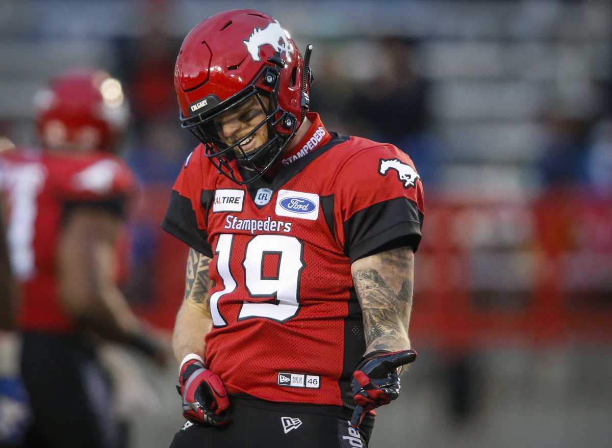 Calgary Stampeders quarterback Bo Levi Mitchell plays air-guitar as he celebrates a touchdown pass during first half CFL football action againt the Winnipeg Blue Bombers in Calgary, Saturday, Oct. 19, 2019. Bo Levi Mitchell has really been a thorn in the side of the Winnipeg Blue Bombers.The Calgary quarterback sports an 11-2 all-time record versus Winnipeg, his latest win being a 37-33 home decision over the Blue Bombers on Saturday night. The two teams complete their home-and-home series Friday night at IG Field. 