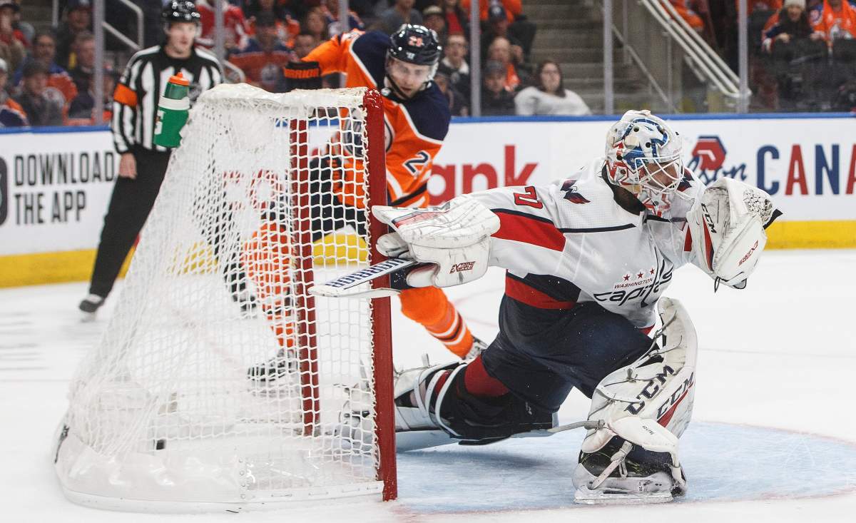 Washington Capitals goalie Braden Holtby (70) is scored on by Edmonton Oilers' Leon Draisaitl (29) during third period NHL action in Edmonton, Alta., on Thursday October 24, 2019. THE CANADIAN PRESS/Jason Franson.