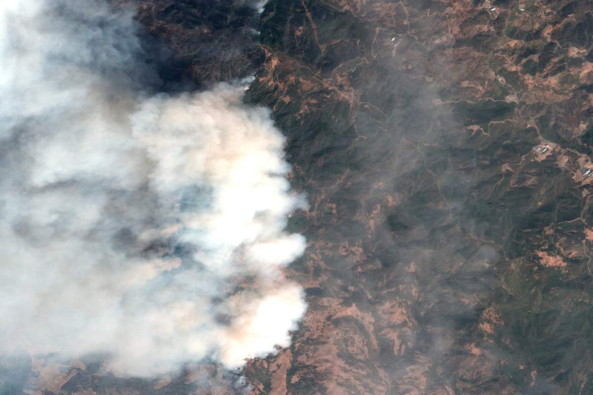 This satellite image provided by Maxar Technologies shows a wildfire burning in Sonoma County, Calif., on Thursday, Oct. 24, 2019. (Satellite image ©2019 Maxar Technologies via AP)