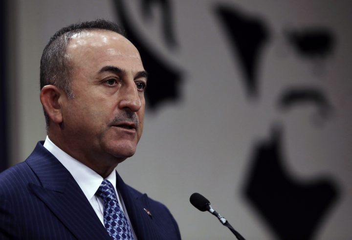 Turkey's Foreign Minister Mevlut Cavusoglu speaks during a joint news conference with Guinea-Bissau Foreign Minister Suzi Carla Barbosa, in Ankara, Turkey, Monday, Oct. 28, 2019. Cavusoglu says the Turkish military will attack any Syrian Kurdish fighter that remains along the border area in northeast Syria after a deadline for them to leave expires.
