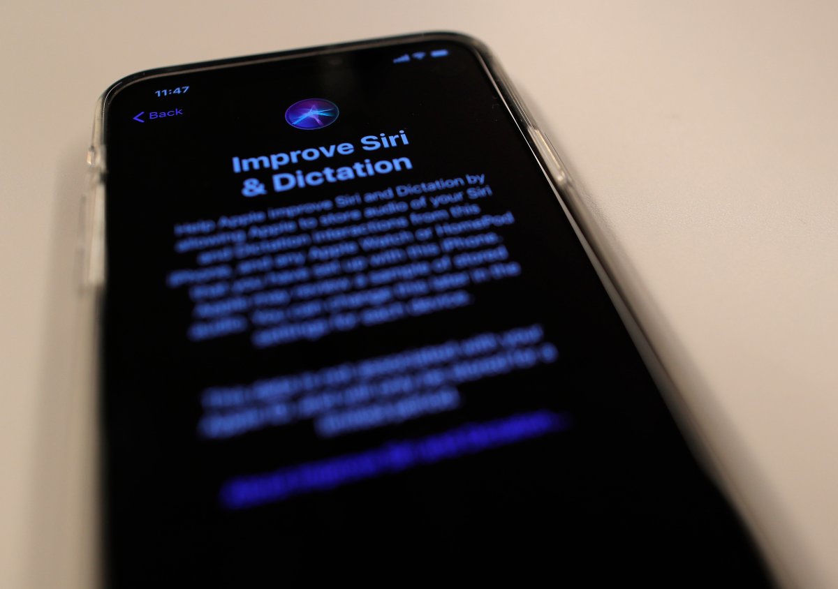 A screen displays a notice when installing the update, iOS 13.2 on an iPhone on Tuesday, Oct. 29, 2019, in New York.