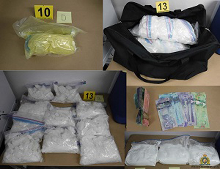 Drugs and cash seized from a home in Vancouver are seen in an RCMP handout photo on Oct. 11, 2019.