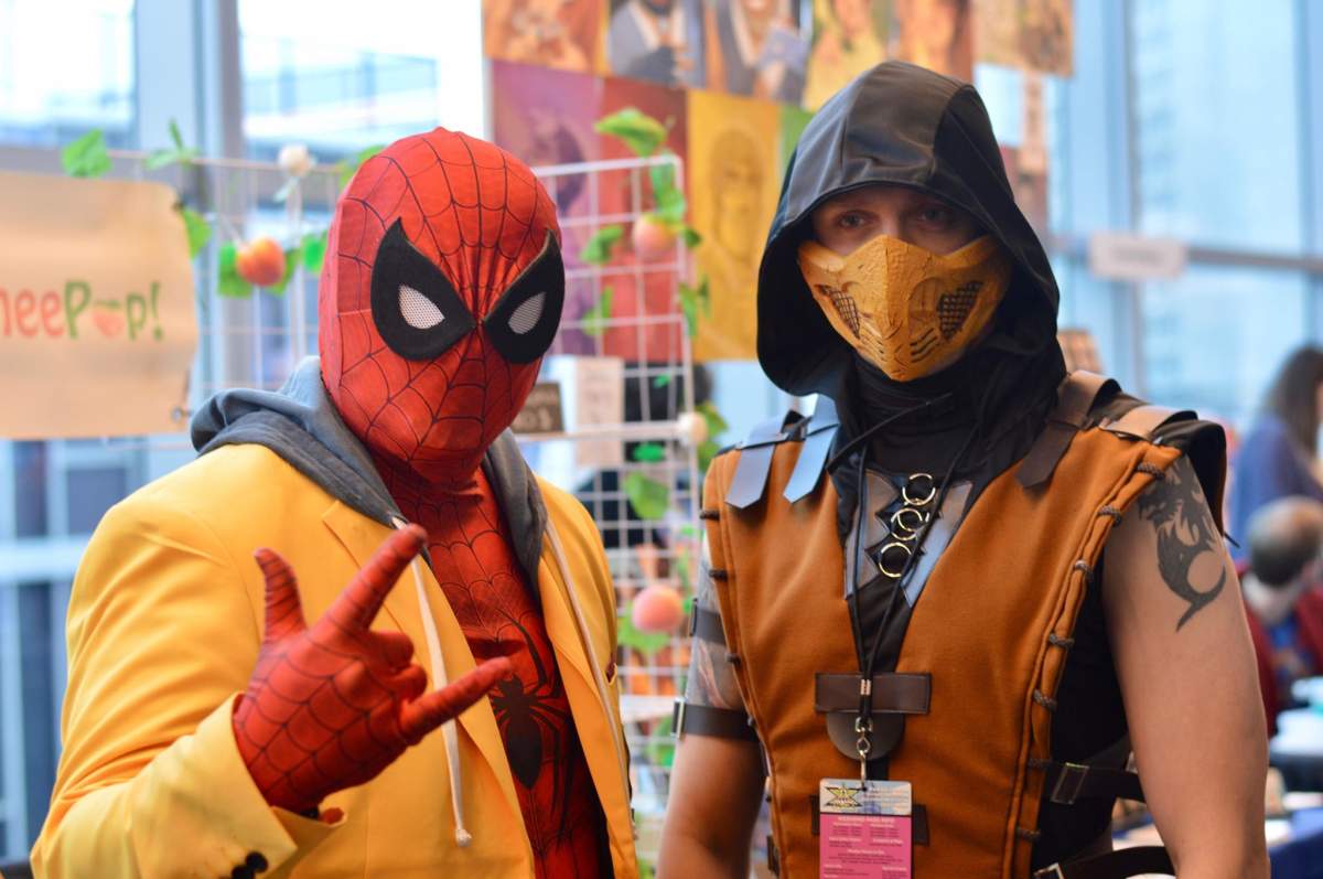 Spider-man and Scorpion from the video game Mortal Kombat pose for a photo at Hal-Con in Halifax, N.S.