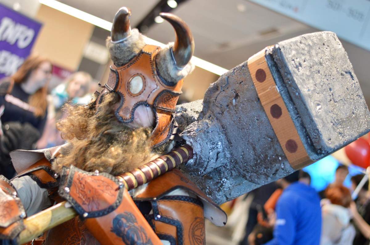 A dwarf wields his large war hammer at Hal-Con in Halifax, N.S., on Oct. 26, 2019.