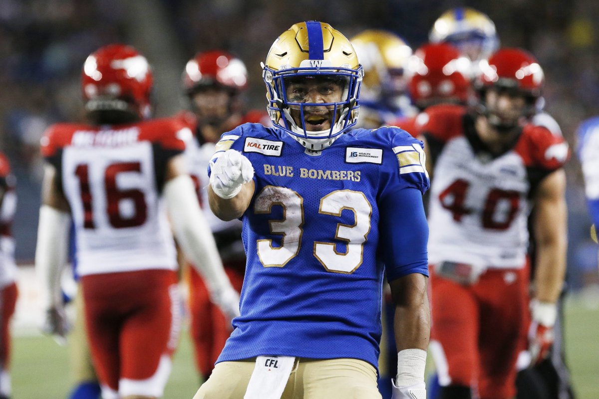 Winnipeg Blue Bombers' Andrew Harris (33) celebrates his run deep in the Calgary Stampeders' zone during the second half of CFL action in Winnipeg Thursday, Aug. 8, 2019.