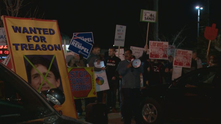 As Trudeau took to the stage in Calgary on Saturday night, a pro-oil rally kicked off outside his venue.