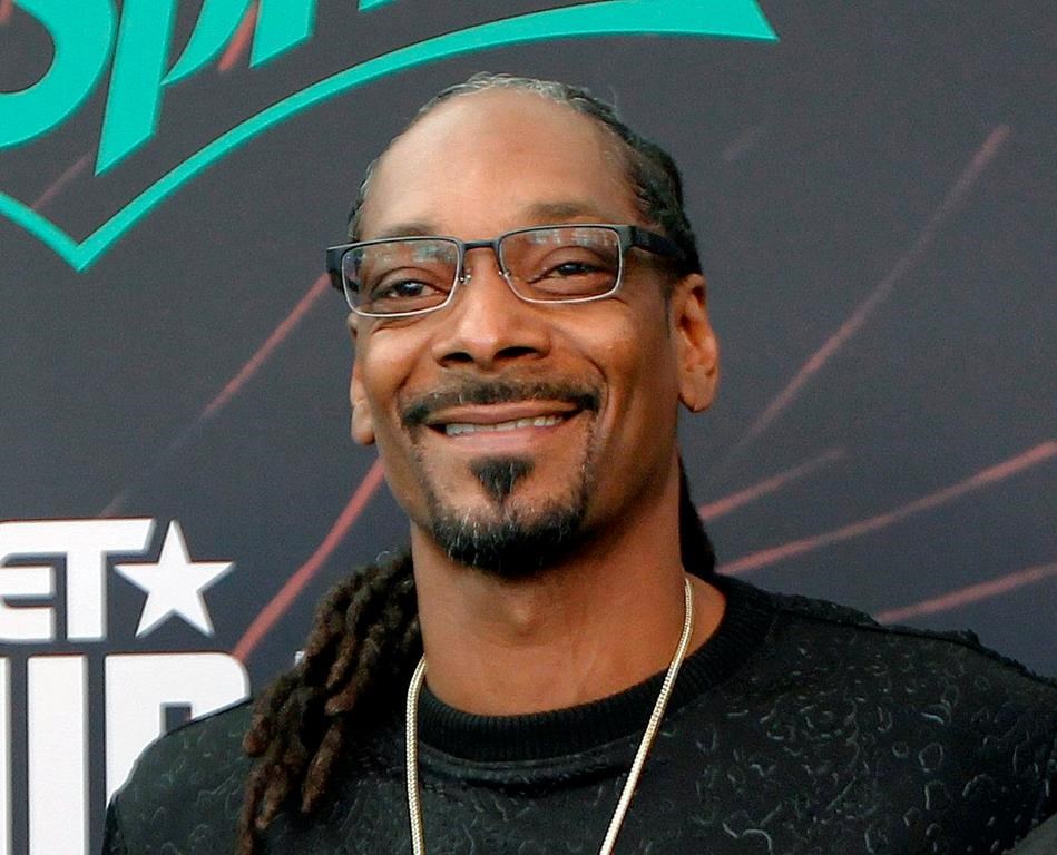 In this Sept. 17, 2016 file photo, Snoop Dog smiles at the BET Hip Hop Awards in Atlanta, Ga.