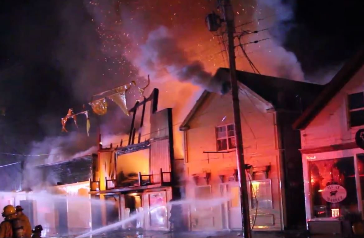 Firefighters battle a blaze in Canning, N.S., on Oct. 7, 2019.