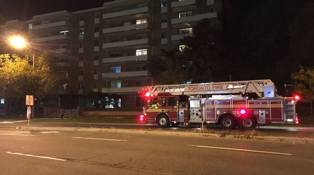Toronto firefighters attend a York Mills Road apartment building Friday evening.