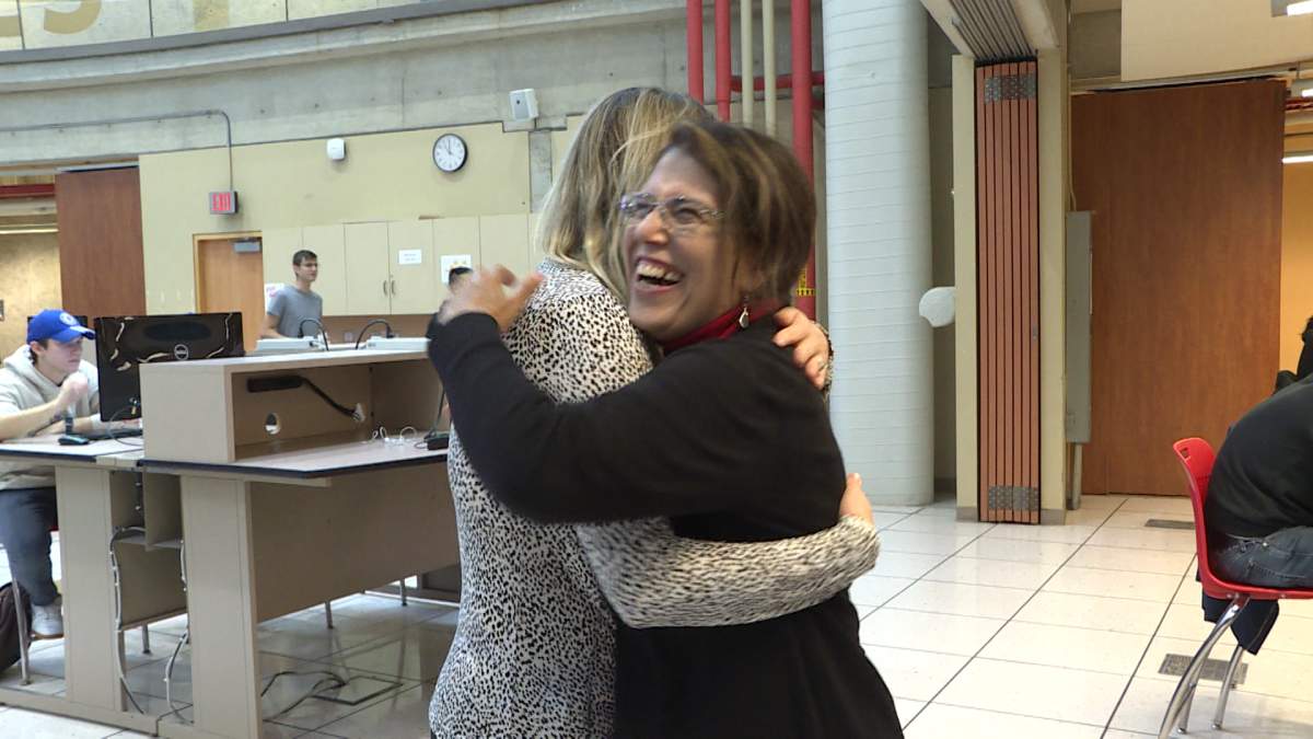 Co-Worker congratulating Deena Salem about becoming a canadian citizen in 24 hours time.