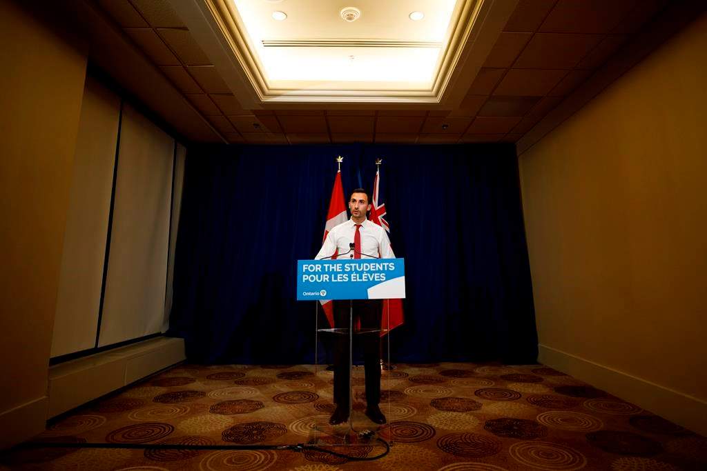 Ontario Minister of Education Stephen Lecce speaks during a press conference to announce a tentative deal reached with CUPE in Toronto, Sunday, Oct. 6, 2019.