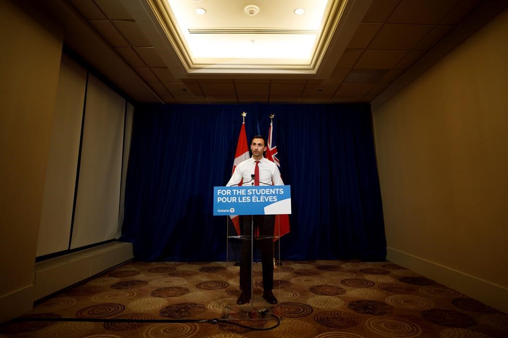 Ontario Minister of Education Stephen Lecce speaks during a press conference to announce a tentative deal reached with CUPE in Toronto, Sunday, Oct. 6, 2019.