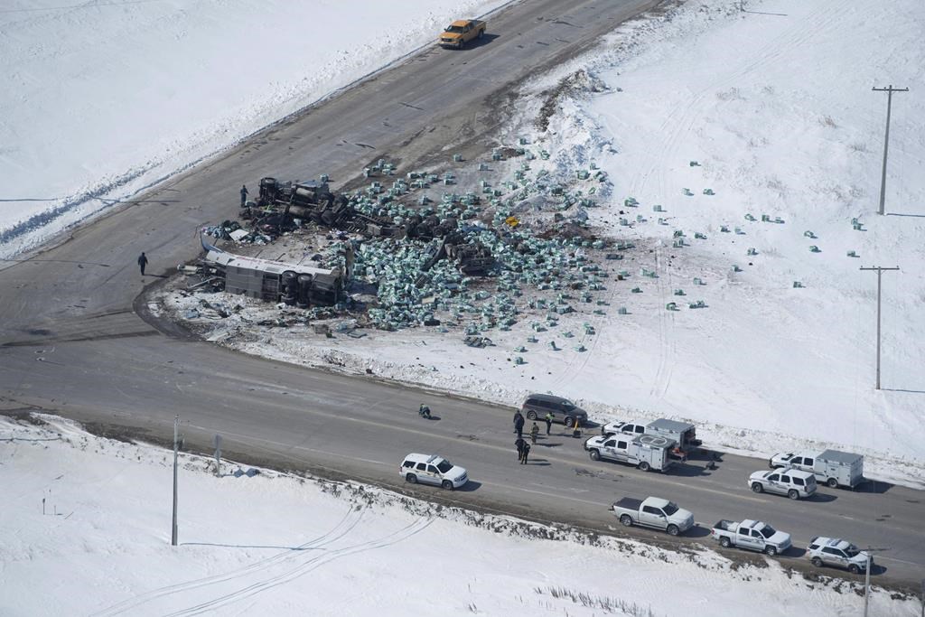 The wreckage of the Humboldt Broncos hockey bus crash is shown outside of Tisdale, Sask., on Saturday, April, 7, 2018.