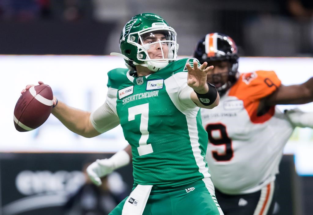 Saskatchewan Roughriders quarterback Cody Fajardo passes against the B.C. Lions during the first half of a CFL football game in Vancouver, on Oct. 18, 2019.