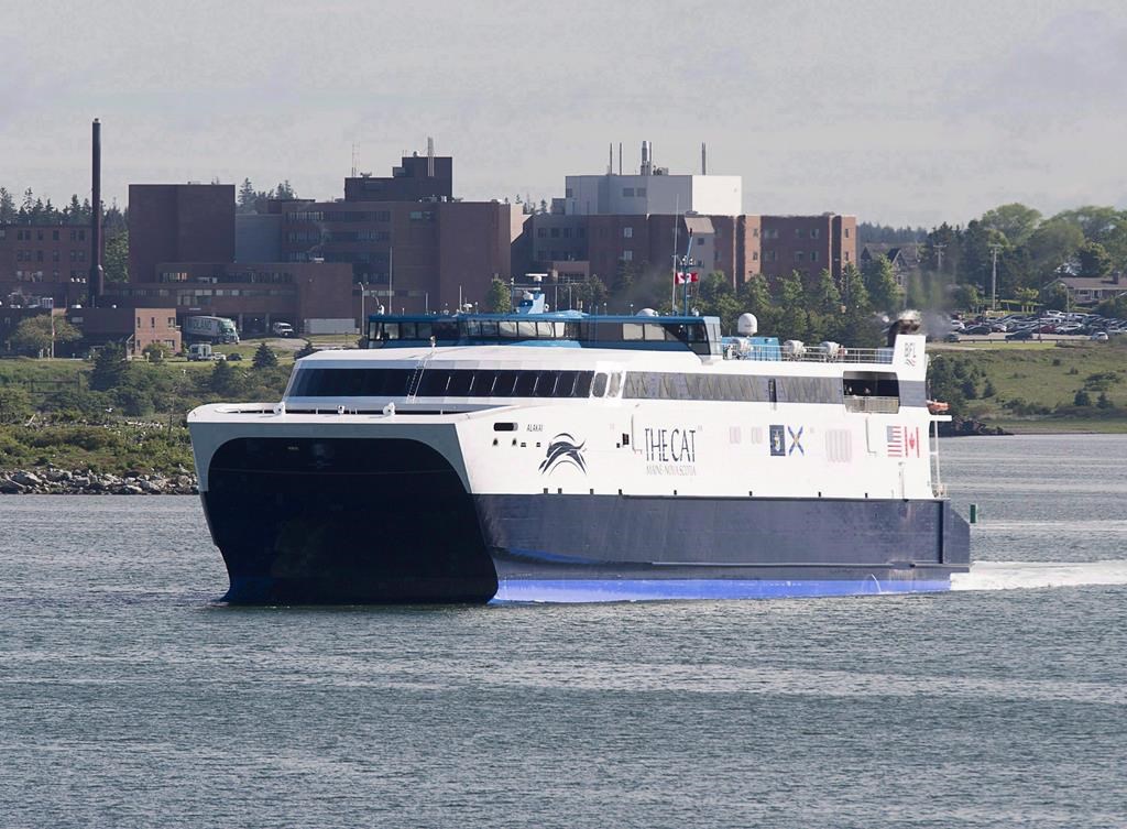 The CAT, a high-speed passenger ferry, departs Yarmouth, N.S. heading to Portland, Maine on its first scheduled trip on Wednesday, June 15, 2016.