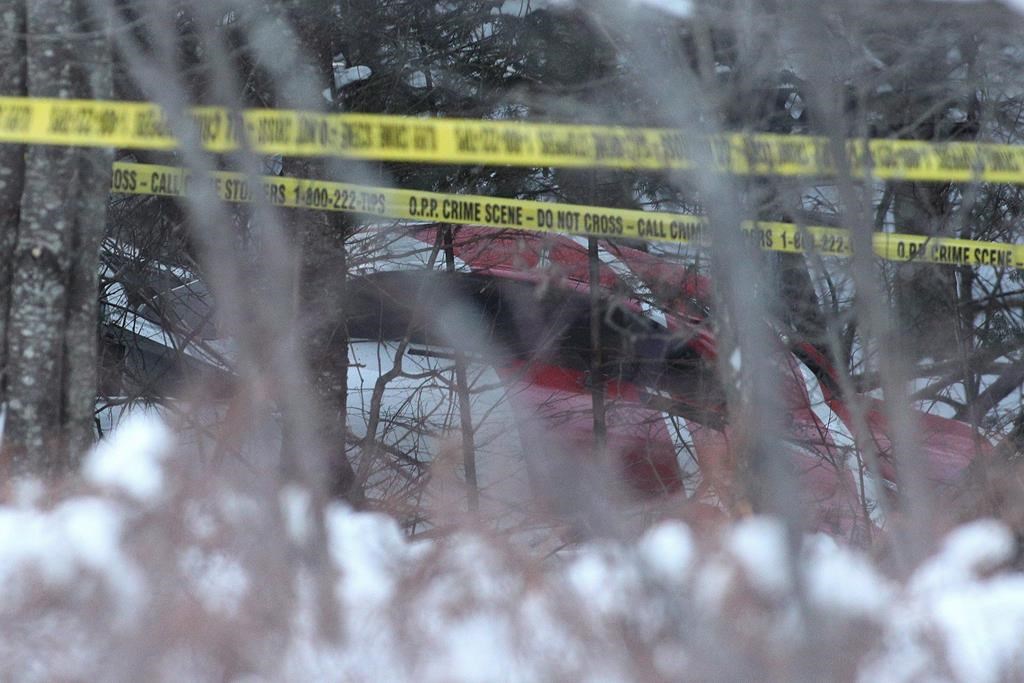 A crashed Hydro One helicopter can be seen near Tweed, Ont., on December 14, 2017. The federal transportation safety watchdog is expected to release the findings of its probe of a Hydro One helicopter crash that killed four men nearly two years ago.