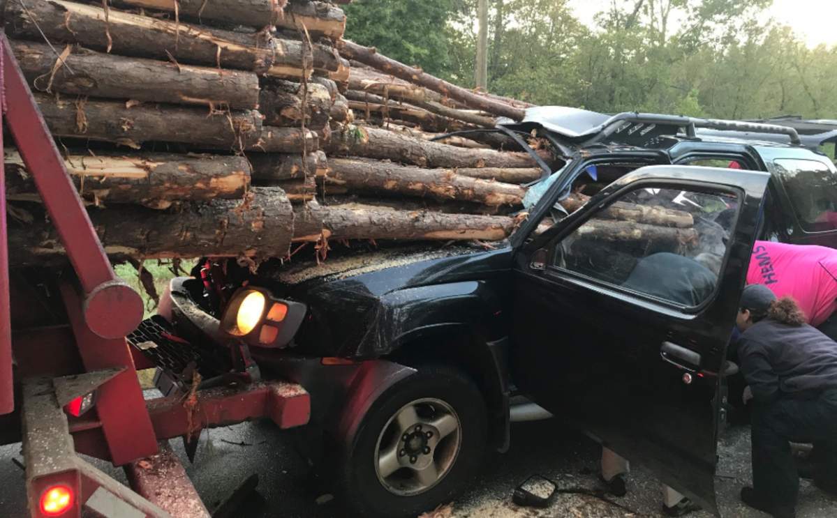 A car crashed into the back of a logging truck on Oct. 11.