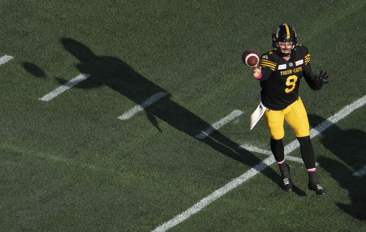 Hamilton Tiger-Cats quarterback Dane Evans throws during first half CFL football game action against the Ottawa Redblacks in Hamilton, Ont. on Saturday,.