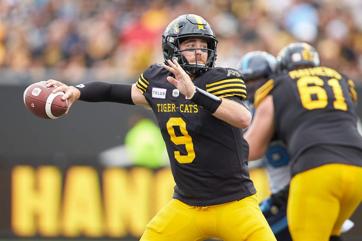 Tiger-Cats Quarterback Dane Evans throws a pass in 2019 CFL game at Tim Horton's field in Hamilton, Ont.
