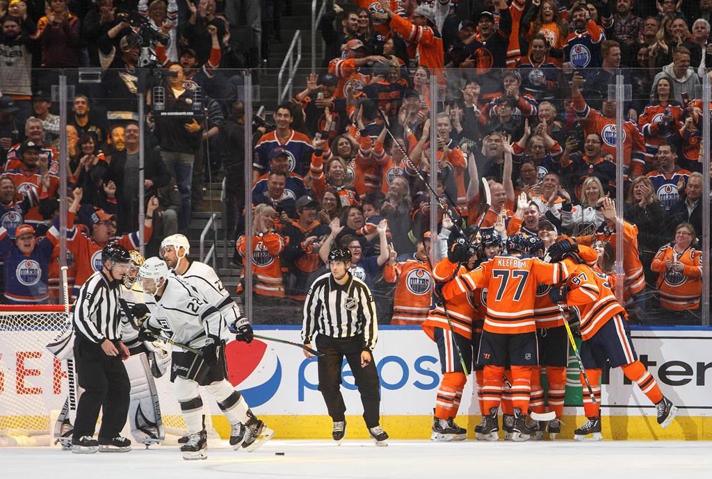 Edmonton Oilers celebrate a goal during third period NHL action against the Los Angeles Kings, in Edmonton, Saturday, Oct. 5, 2019. THE CANADIAN PRESS/Jason Franson.