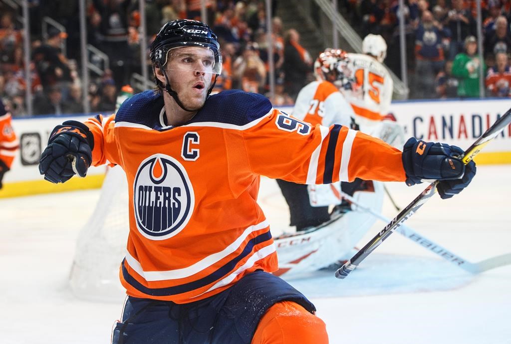 Edmonton Oilers' Connor McDavid (97) celebrates a goal against the Philadelphia Flyers during second period NHL action in Edmonton, Alta., on Wednesday October 16, 2019. THE CANADIAN PRESS/Jason Franson.