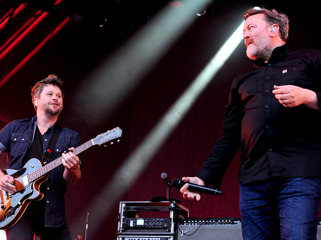 Guy Garvey and Mark Potter of Elbow perform at Castlefield Bowl on July 9, 2019 in Manchester, England.