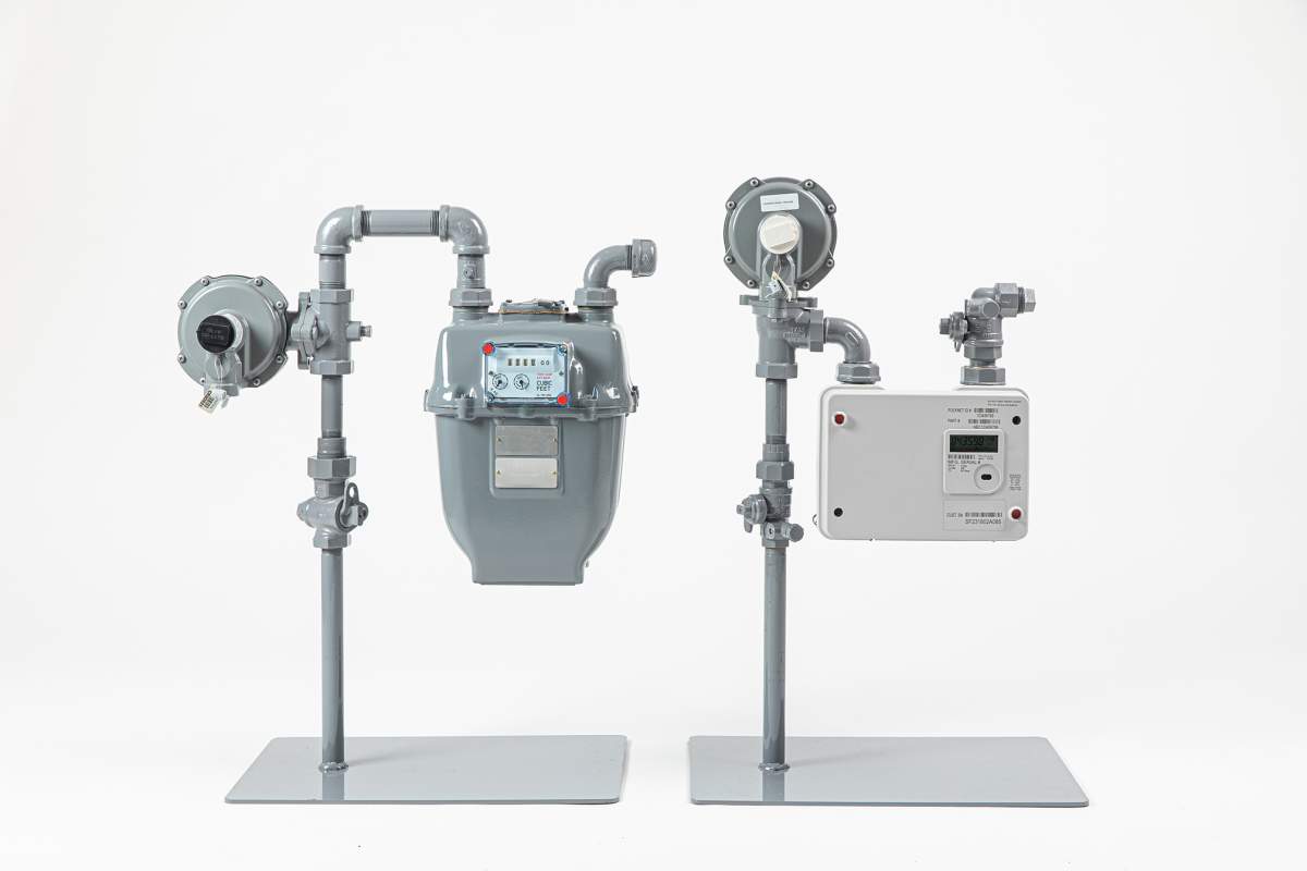 Traditional (left) and new advanced (right) FortisBC gas meters. 