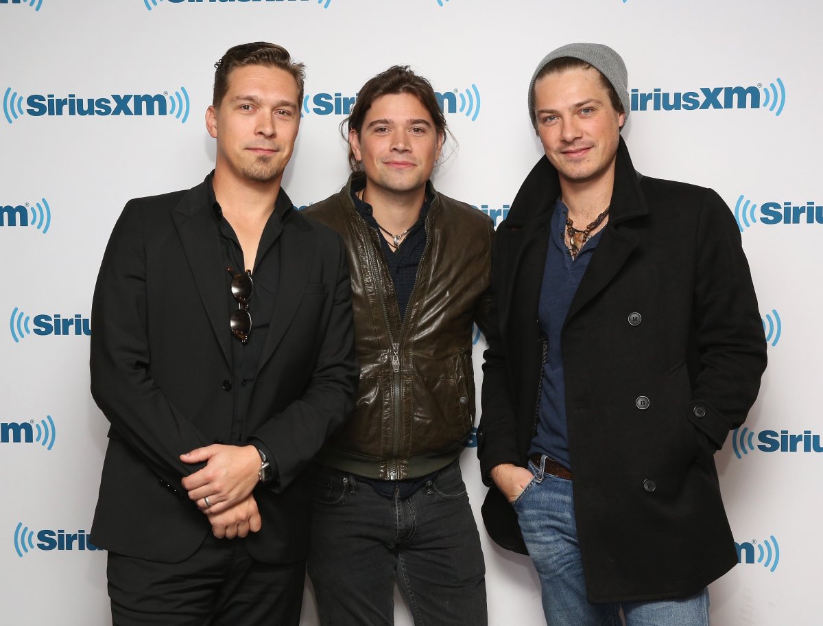 Isaac Hanson, Zac Hanson and Taylor Hanson of Hanson visit SiriusXM Studios on Oct. 16, 2015 in New York City.