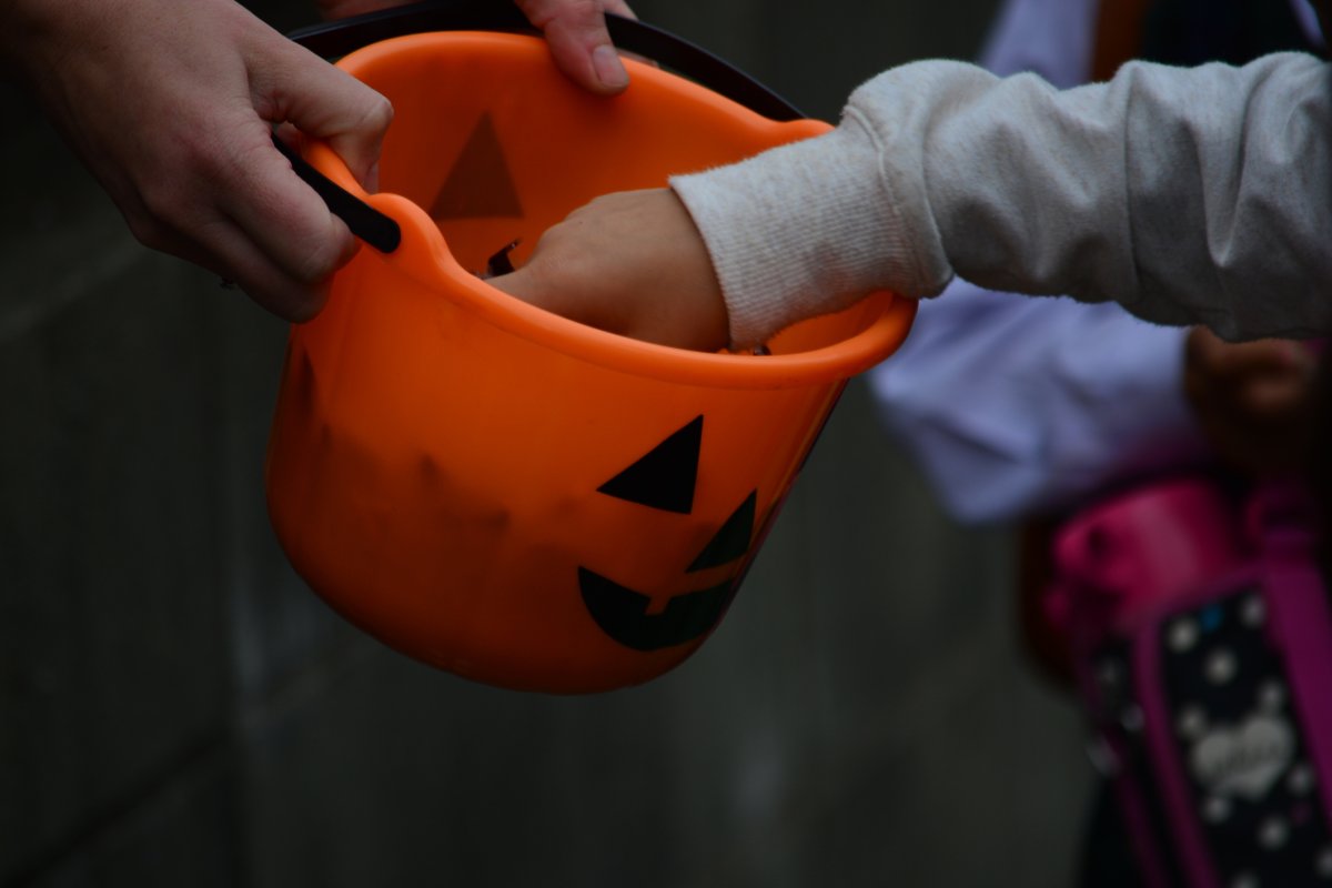 Hand out candy with a tong for safety, says Waterloo Region's top doctor.