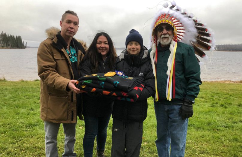 Greta Thunberg meets with members of Mikisew Cree First Nation on Oct. 19, 2019. Councillor Calvin Waquan (L), Mikisew director of government Melody Lepine, and Chief Archie Waquan (R) presented a gift to the activist. 