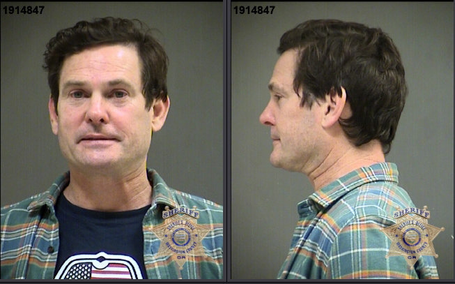This image provided by the Washington County Sheriff's Office shows booking photos of actor Henry Thomas.  Authorities say Thomas, the actor who starred as a child in "E.T. the Extra Terrestrial," was arrested for driving under the influence in Oregon. The 48-year-old was booked into the Washington County Jail and faces the misdemeanor charge after police said they found him Monday in a stationary car.