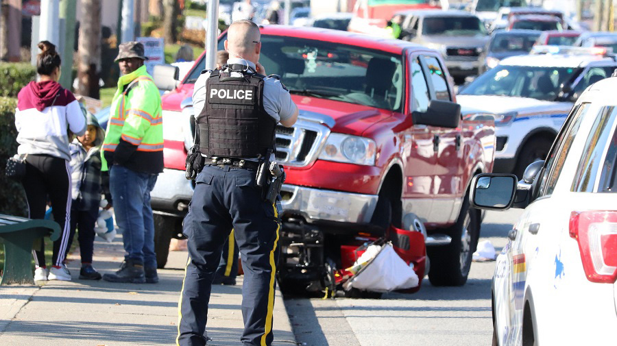 Surrey RCMP at the scene of a collision involving a pickup truck and a mobility scooter on Oct. 26, 2019.