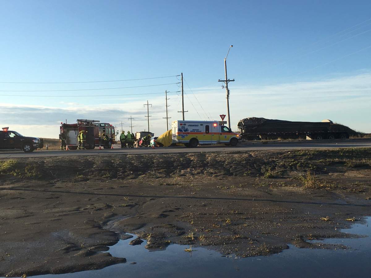 Emergency personnel at the scene of a serious crash on the South Perimeter near Brady Road Oct. 25.
