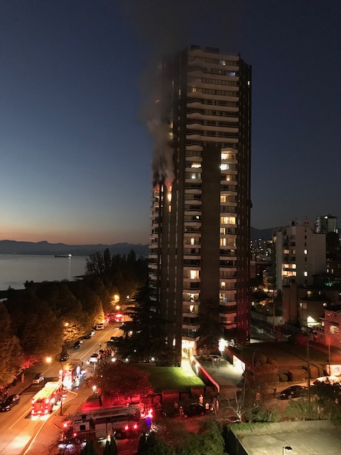 Smoke and flames pour out of a West End apartment building on Oct. 31, 2019.