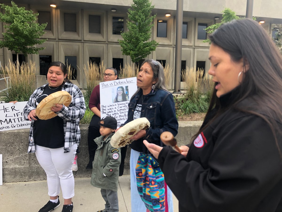 As the trial of London Constable Nicholas Doering continued at the courthouse, family and supporters of Debra Chrisjohn gathered outside for an Indigenous drum and singing ceremony.