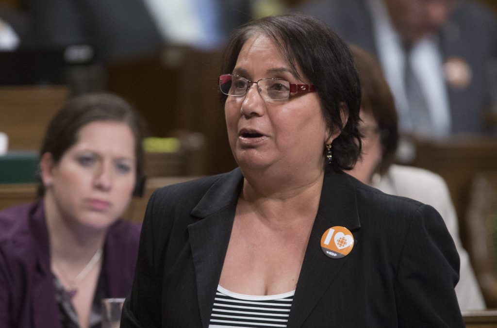 NDP MP Jinny Jogindera Sims rises during Question Period in the House of Commons on Thursday May 1, 2014 in Ottawa.