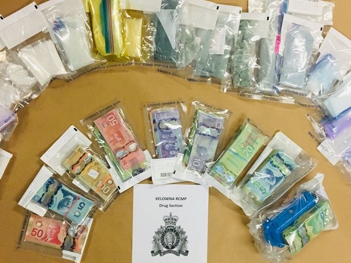 Kelowna RCMP say they seized $30,000 in cash, and more than 1.5 kilograms of fentanyl, cocaine and methamphetamine from two homes and one industrial property in West Kelowna in March.