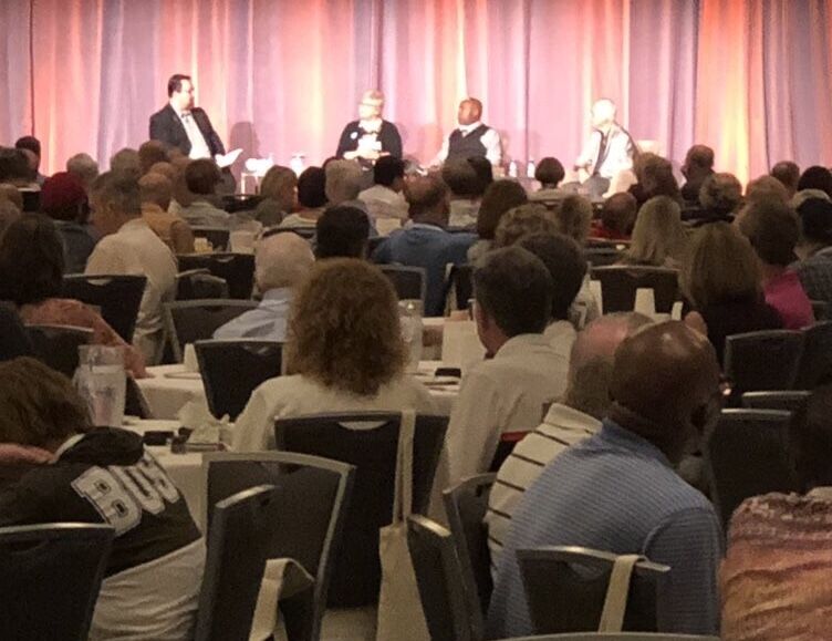 Larry Gifford on stage at the Parkinson IQ + You event in Atlanta, Ga.