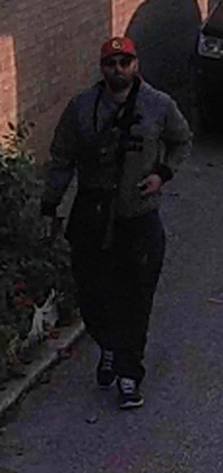 Security camera image of man who abandoned suspect vehicle. Toronto police seeking assistance in identifying him.