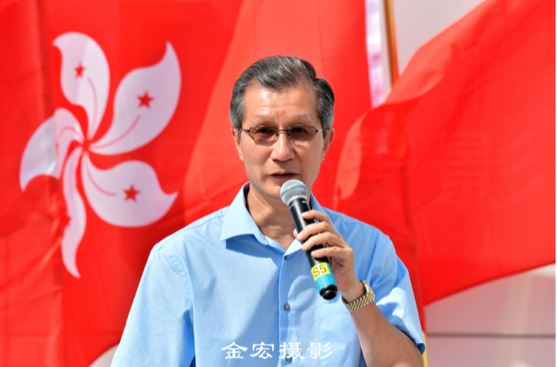 Michael Chan gives a speech at a counter-rally organized by the Toronto Confederation of Chinese Canadian Organizations in August.
