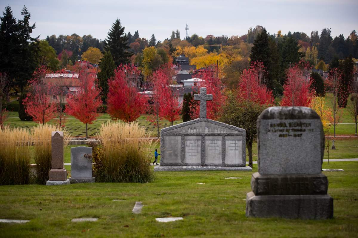 A man walks through Mountain View Cemetery in Vancouver on Wednesday, Oct. 23, 2019.